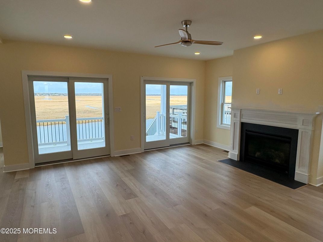 Empty room, Fireplace, Interior, Recessed Lighting, Wood Texture Flooring
