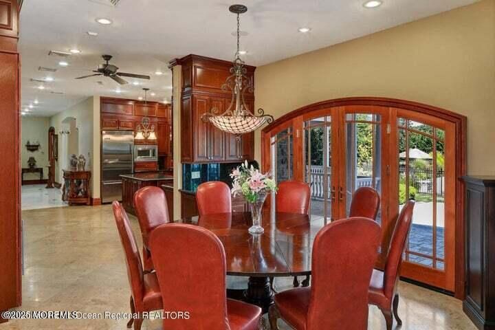 Chandelier, Dining room, Interior, Kitchen, Pendant Lights, Recessed Lighting, Stainless Steel Appliances