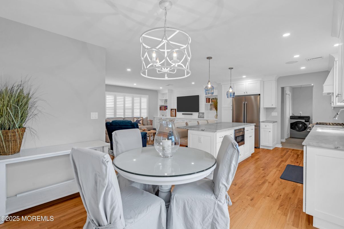 Dining room, Interior, Kitchen, Pendant Lights, Recessed Lighting, Stainless Steel Appliances, Wood Texture Flooring