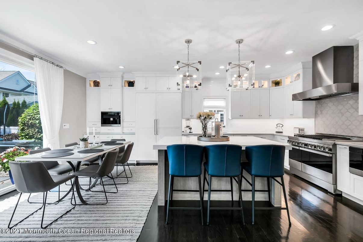 Dining room, Interior, Kitchen, Pendant Lights, Recessed Lighting, Stainless Steel Appliances, Wood Texture Flooring