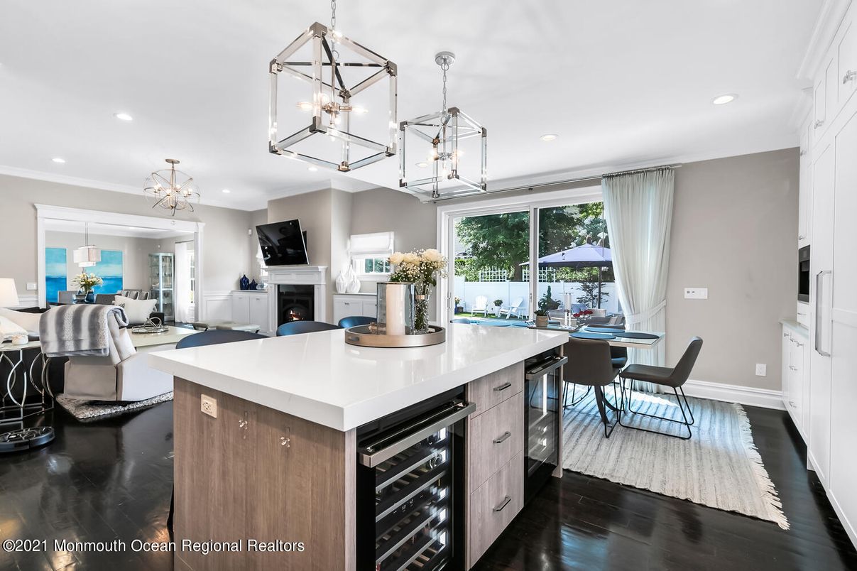 Dining room, Fireplace, Interior, Kitchen, Pendant Lights, Recessed Lighting, Wood Texture Flooring