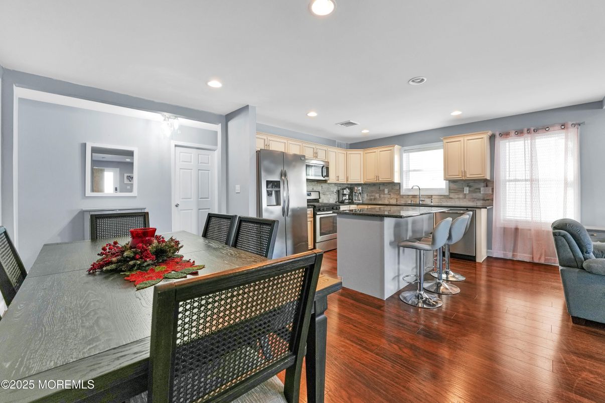 Dining room, Interior, Kitchen, Recessed Lighting, Stainless Steel Appliances, Wood Texture Flooring
