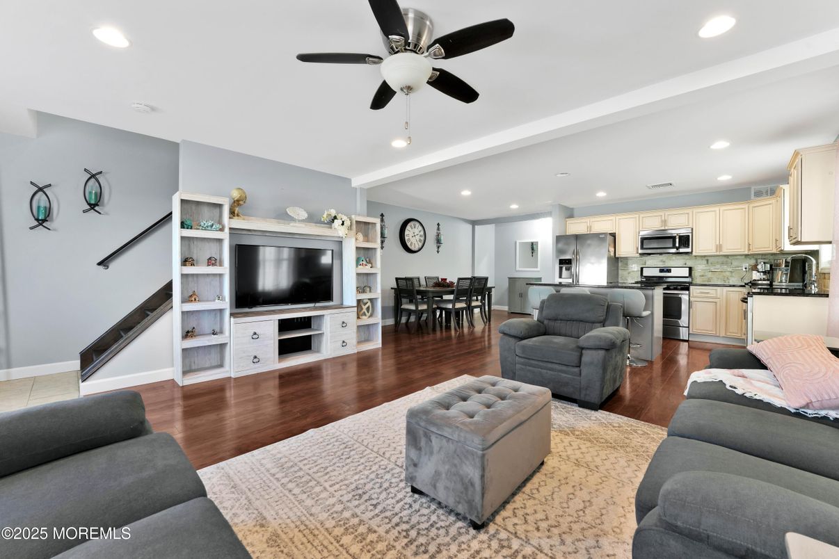 Dining room, Interior, Kitchen, Living room, Recessed Lighting, Stainless Steel Appliances, Wood Texture Flooring