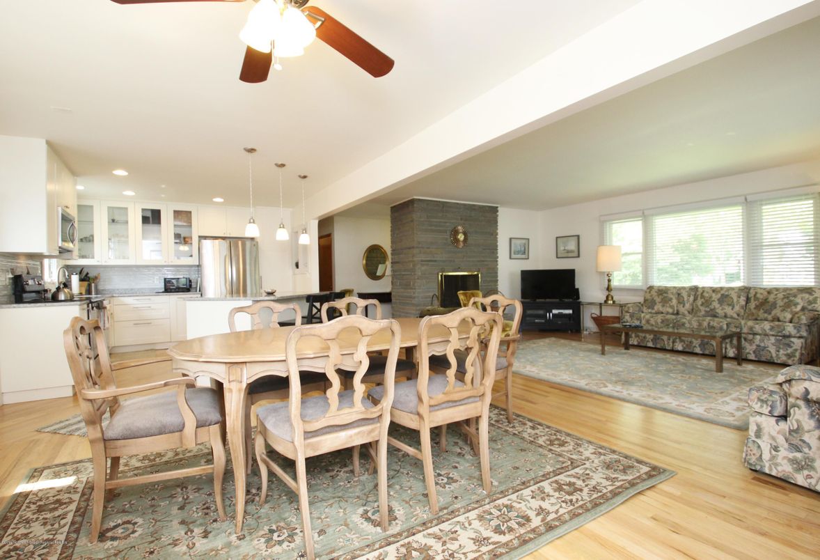 Dining room, Fireplace, Interior, Kitchen, Living room, Pendant Lights, Recessed Lighting, Stone Walls, Wood Texture Flooring