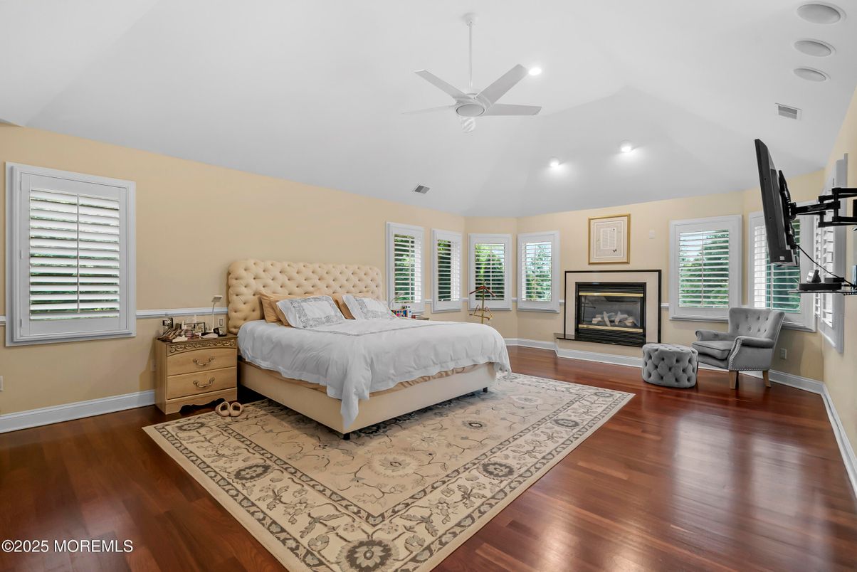 Bedroom, Fireplace, Interior, Recessed Lighting, Wood Texture Flooring