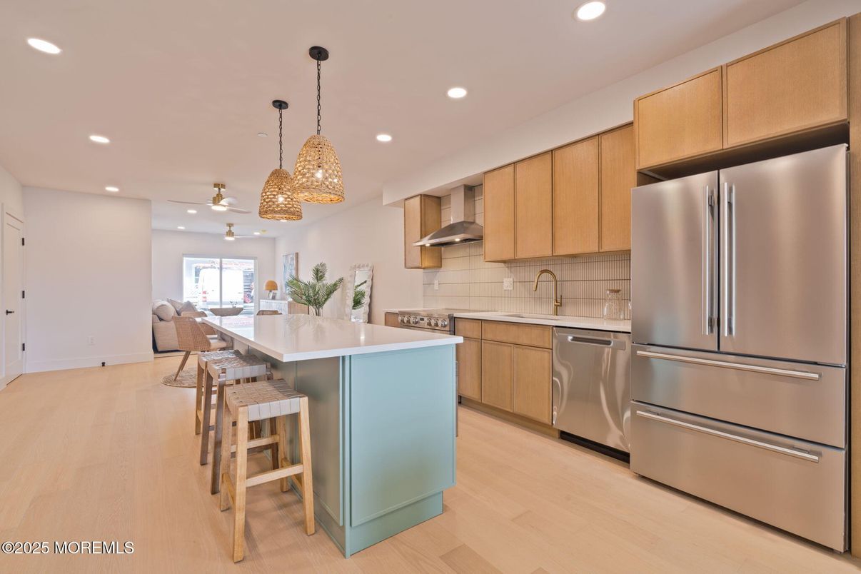 Dining room, Interior, Kitchen, Pendant Lights, Recessed Lighting, Stainless Steel Appliances, Wood Texture Flooring