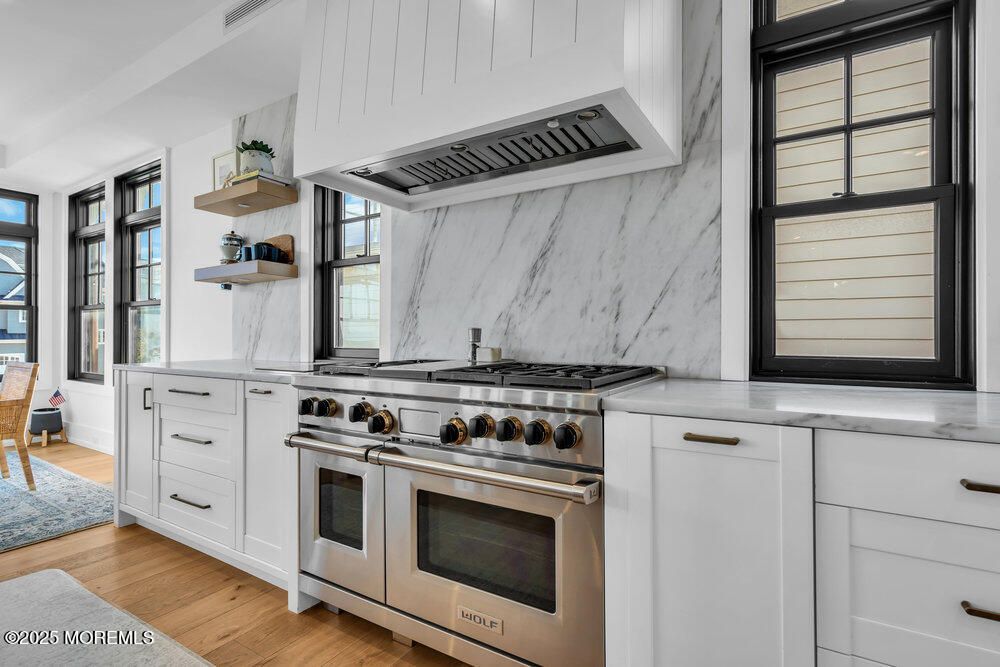 Interior, Kitchen, Marble Walls, Stainless Steel Appliances, Wood Texture Flooring