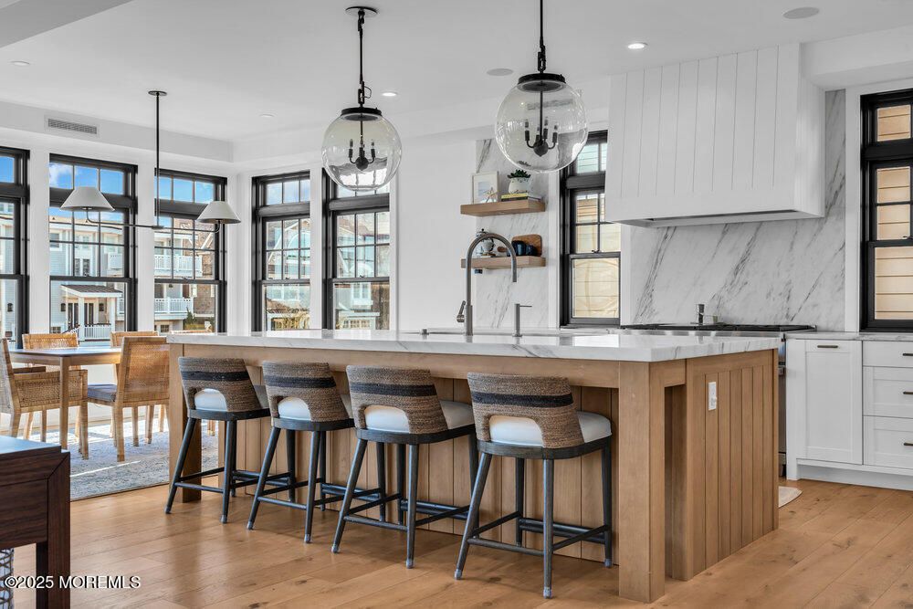 Interior, Kitchen, Marble Walls, Pendant Lights, Recessed Lighting, Wood Texture Flooring