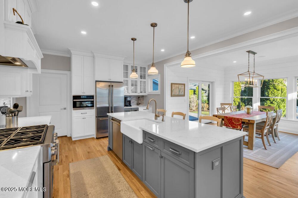 Dining room, Interior, Kitchen, Pendant Lights, Recessed Lighting, Stainless Steel Appliances, Wood Texture Flooring
