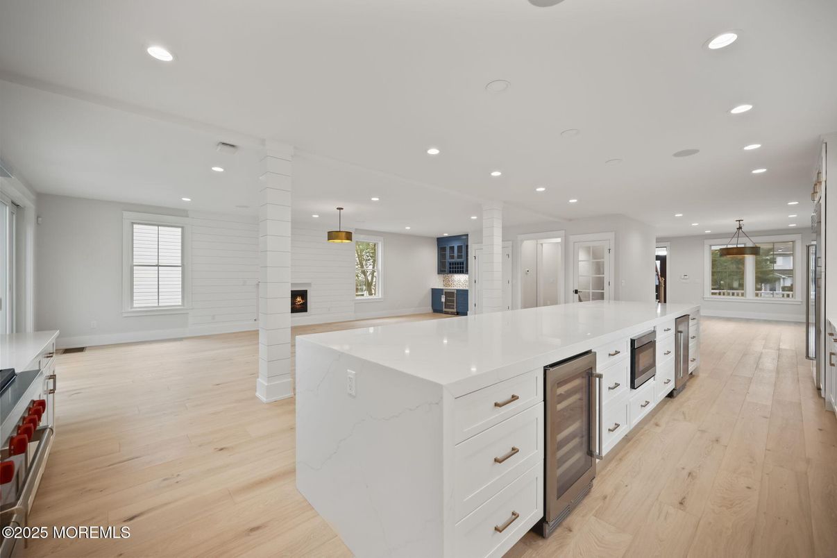 Fireplace, Interior, Kitchen, Pendant Lights, Recessed Lighting, Stainless Steel Appliances, Wood Texture Flooring