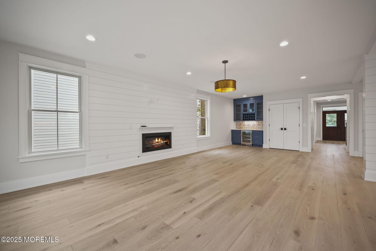 Empty room, Fireplace, Interior, Pendant Lights, Recessed Lighting, Wood Texture Flooring
