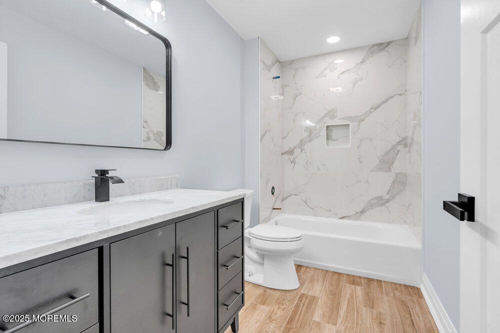 Bathroom, Interior, Marble Walls, Recessed Lighting, Wood Texture Flooring