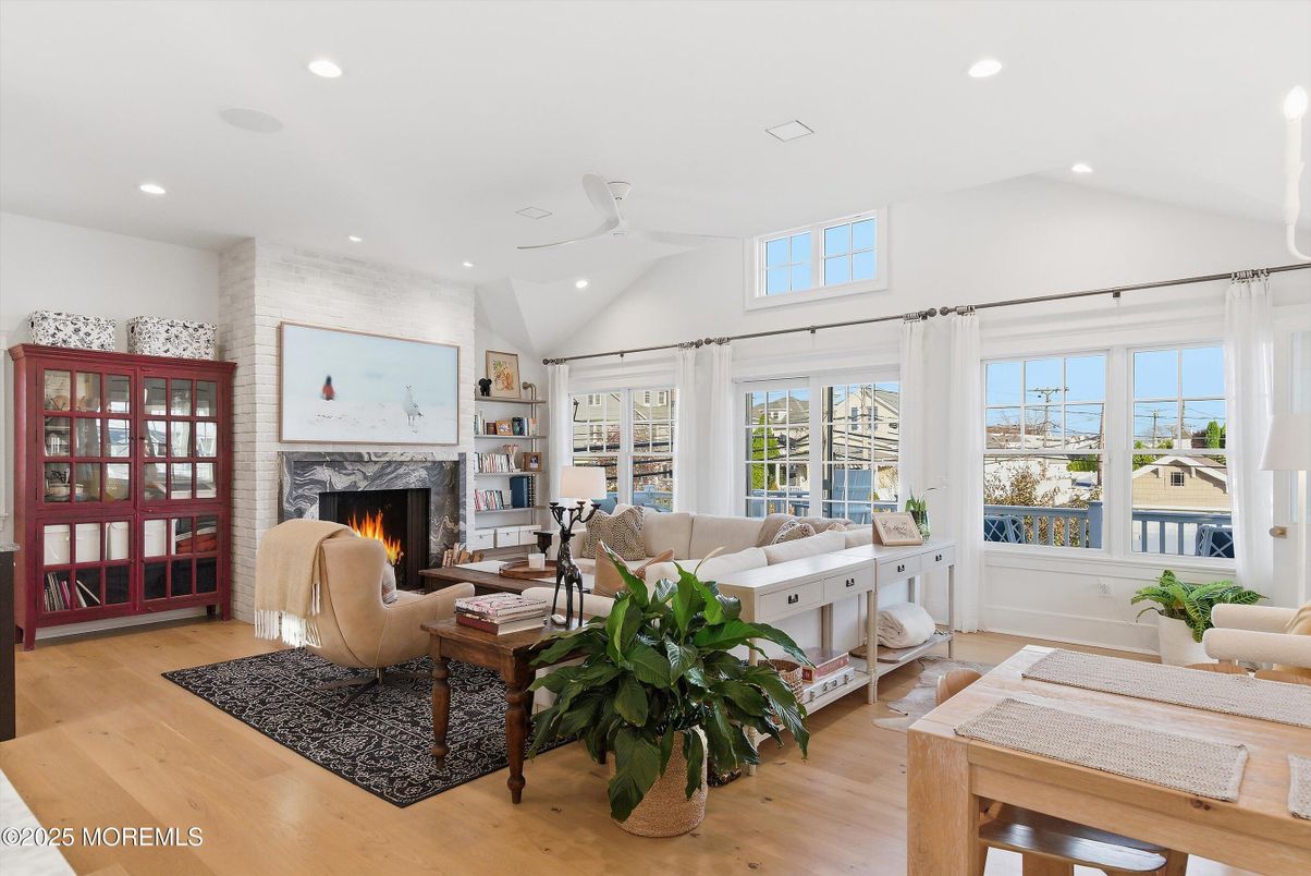 Fireplace, Interior, Living room, Recessed Lighting, Water, Wood Texture Flooring