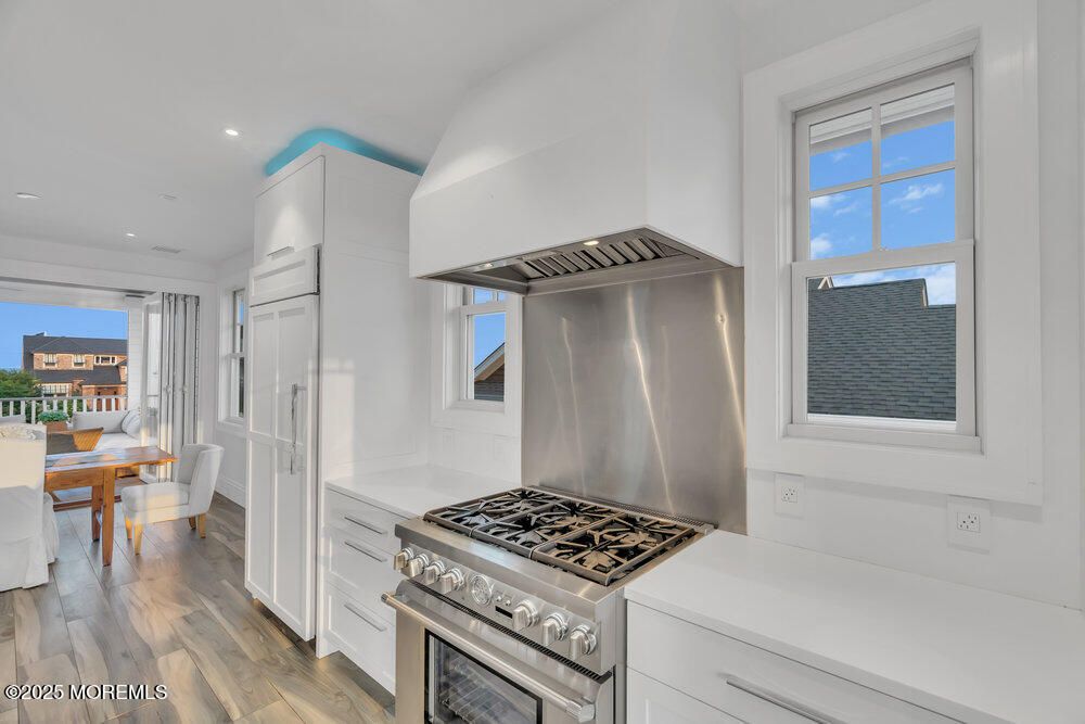 Dining room, Interior, Kitchen, Recessed Lighting, Stainless Steel Appliances, Water, Wood Texture Flooring