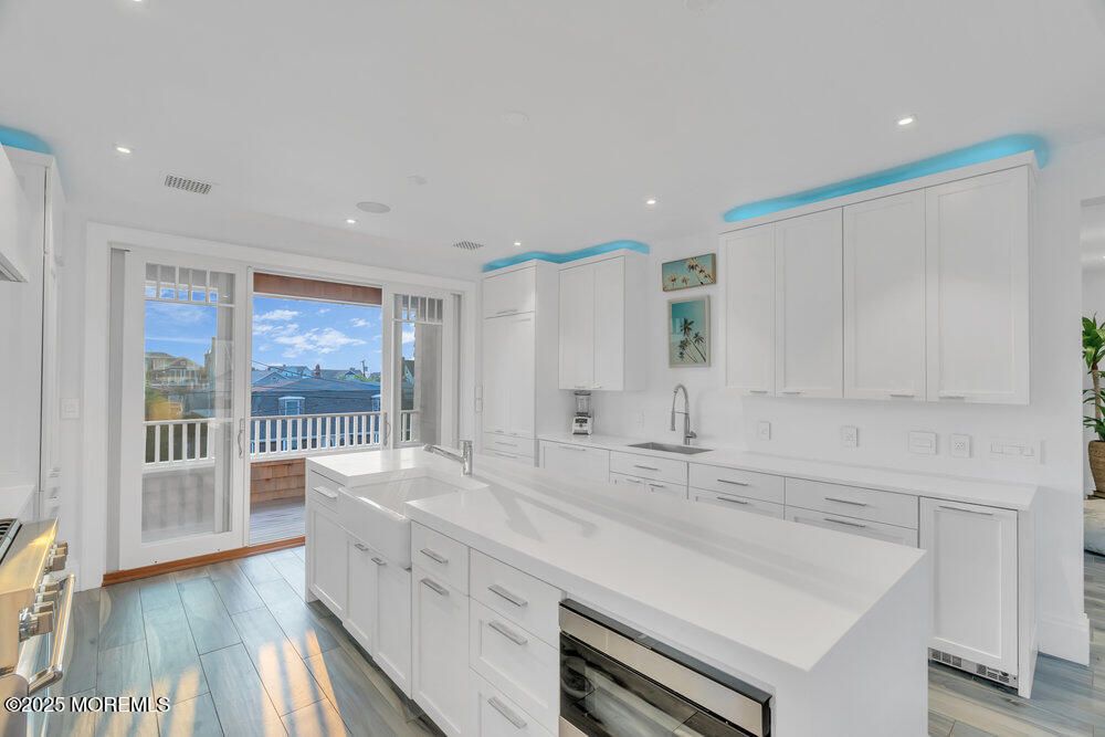 Interior, Kitchen, Recessed Lighting, Stainless Steel Appliances, Water, Wood Texture Flooring