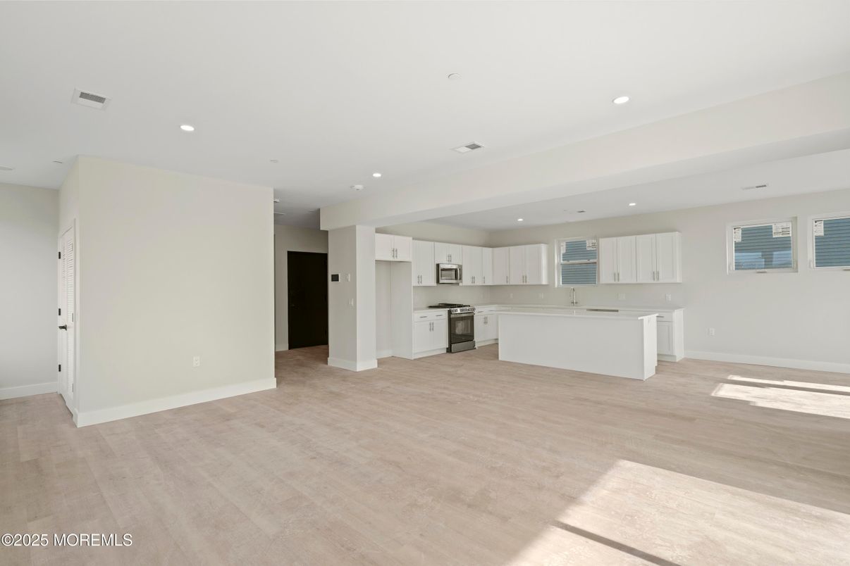 Empty room, Interior, Kitchen, Recessed Lighting, Stainless Steel Appliances