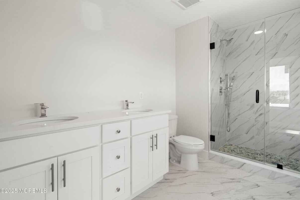 Bathroom, Dual Sink Vanities, Glass Shower, Interior, Marble, Marble Walls