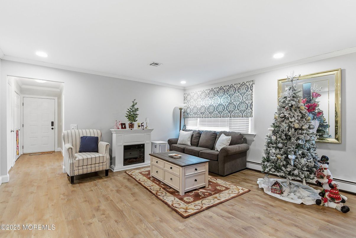 Fireplace, Interior, Living room, Recessed Lighting, Wood Texture Flooring