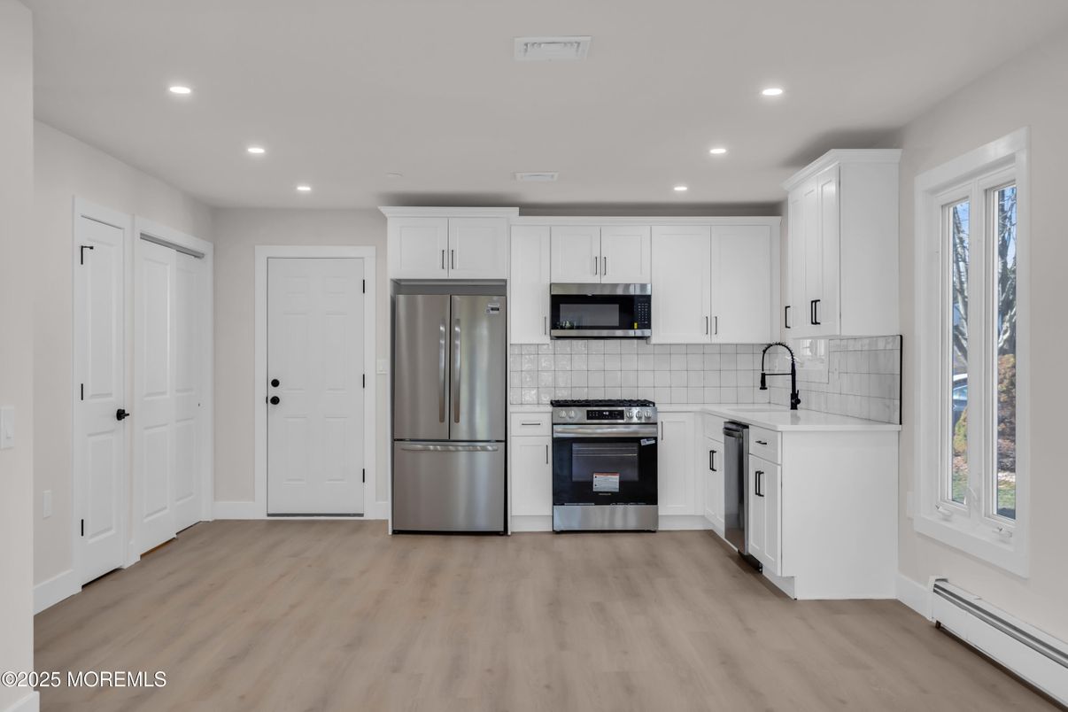 Interior, Kitchen, Recessed Lighting, Stainless Steel Appliances, Wood Texture Flooring