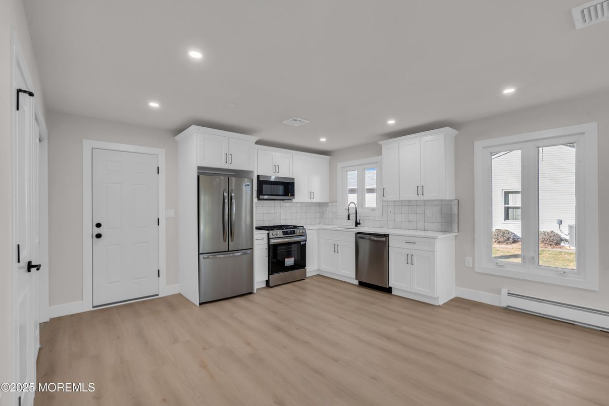 Interior, Kitchen, Recessed Lighting, Stainless Steel Appliances, Wood Texture Flooring