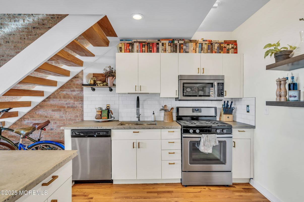 Interior, Kitchen, Recessed Lighting, Stainless Steel Appliances, Stone Walls, Wood Texture Flooring