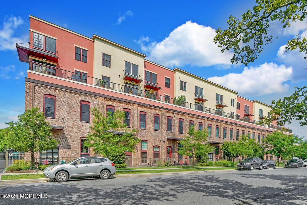 Exterior, Facade, Brick Facade, Condo Building