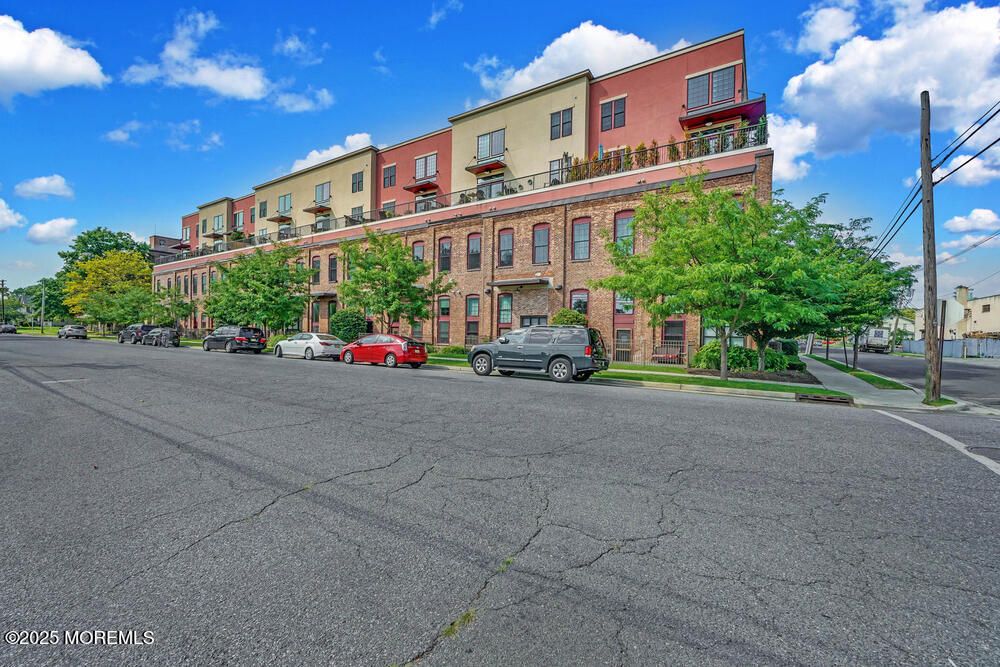 Exterior, Facade, Brick Facade, Condo Building