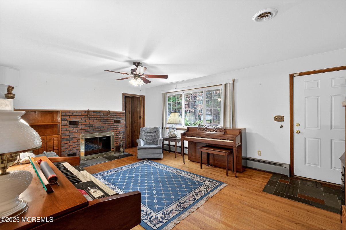 Fireplace, Interior, Piano, Stone Walls, Wood Texture Flooring
