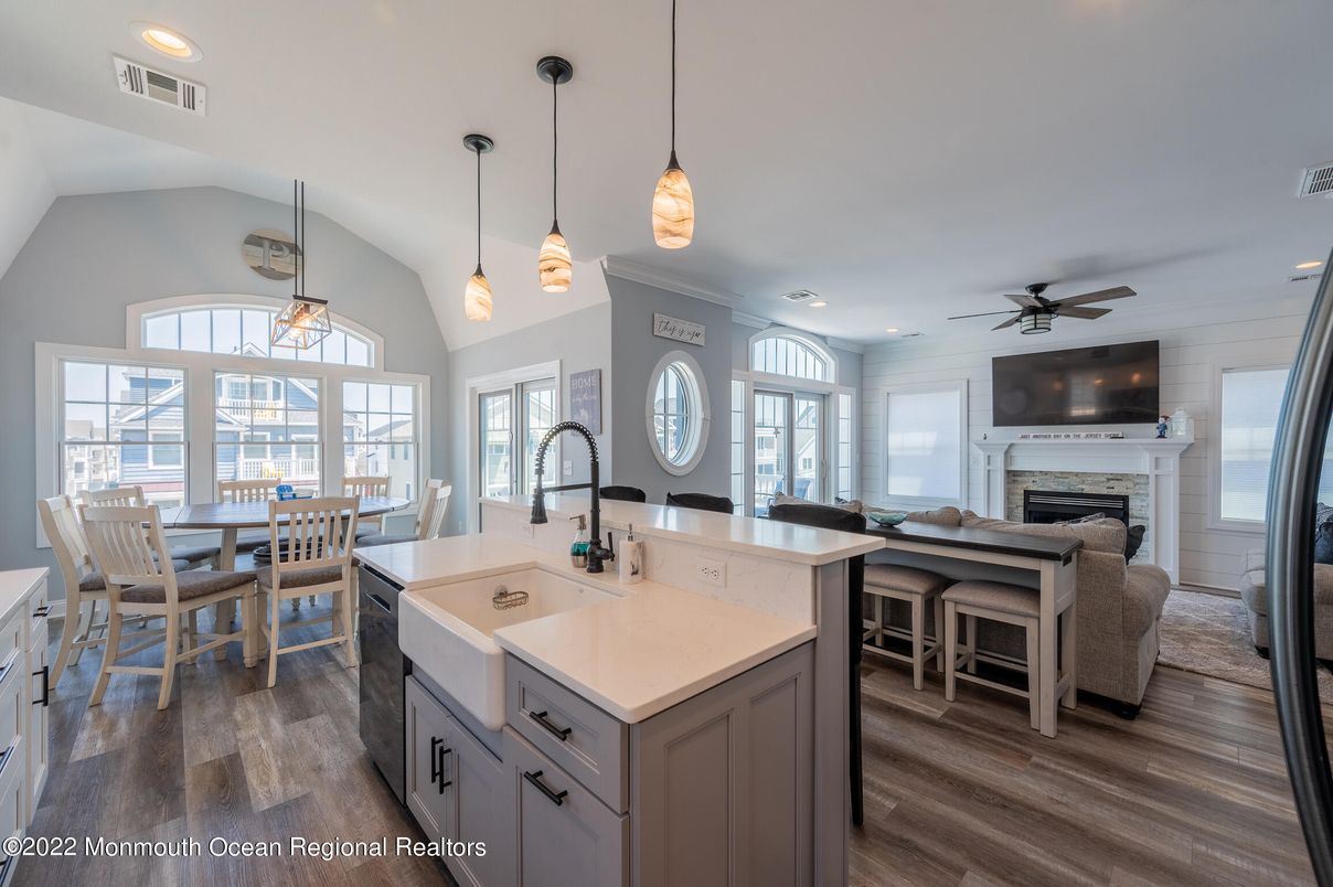 Dining room, Fireplace, Interior, Kitchen, Pendant Lights, Recessed Lighting, Wood Texture Flooring