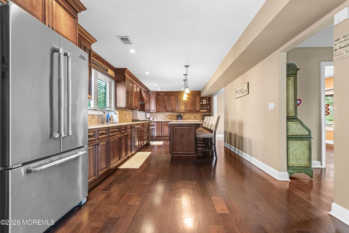 Dining room, Interior, Kitchen, Pendant Lights, Recessed Lighting, Stainless Steel Appliances, Wood Texture Flooring