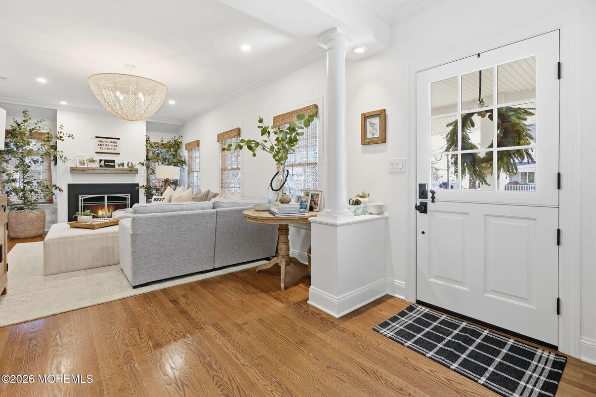 Chandelier, Fireplace, Interior, Living room, Recessed Lighting, Wood Texture Flooring