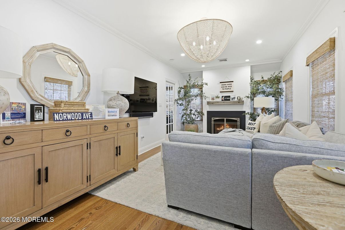 Chandelier, Fireplace, Interior, Living room, Recessed Lighting, Wood Texture Flooring