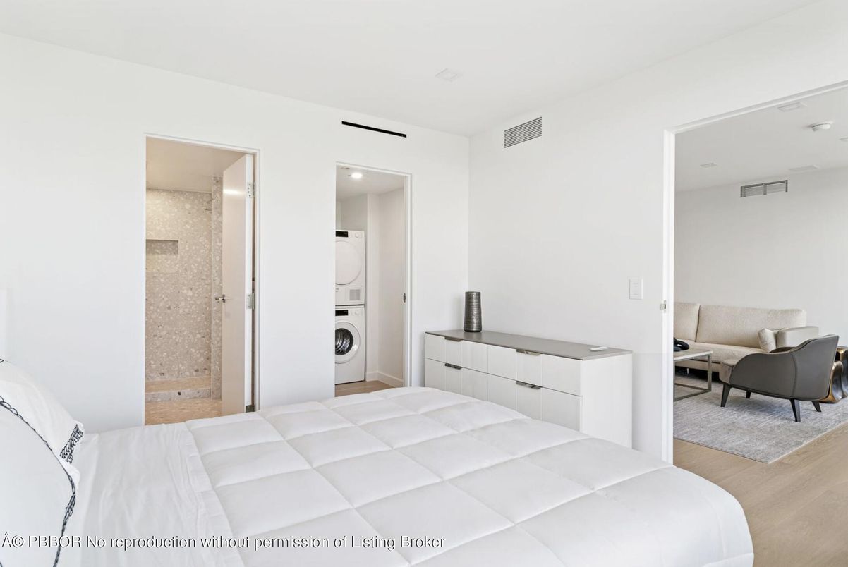 Bedroom, Interior, Recessed Lighting, Utility Closets, Washer, Wood Texture Flooring