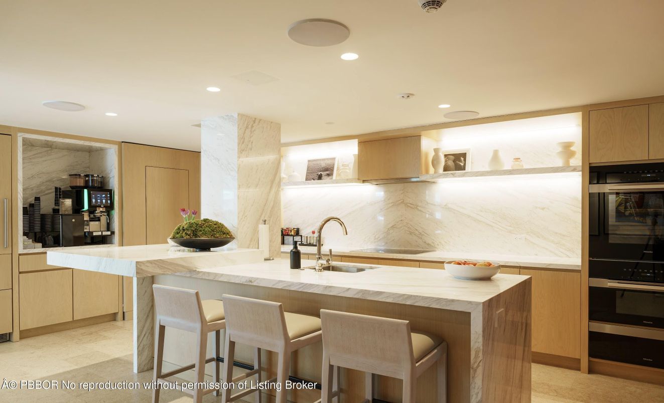 Interior, Kitchen, Marble Walls, Recessed Lighting, Stainless Steel Appliances