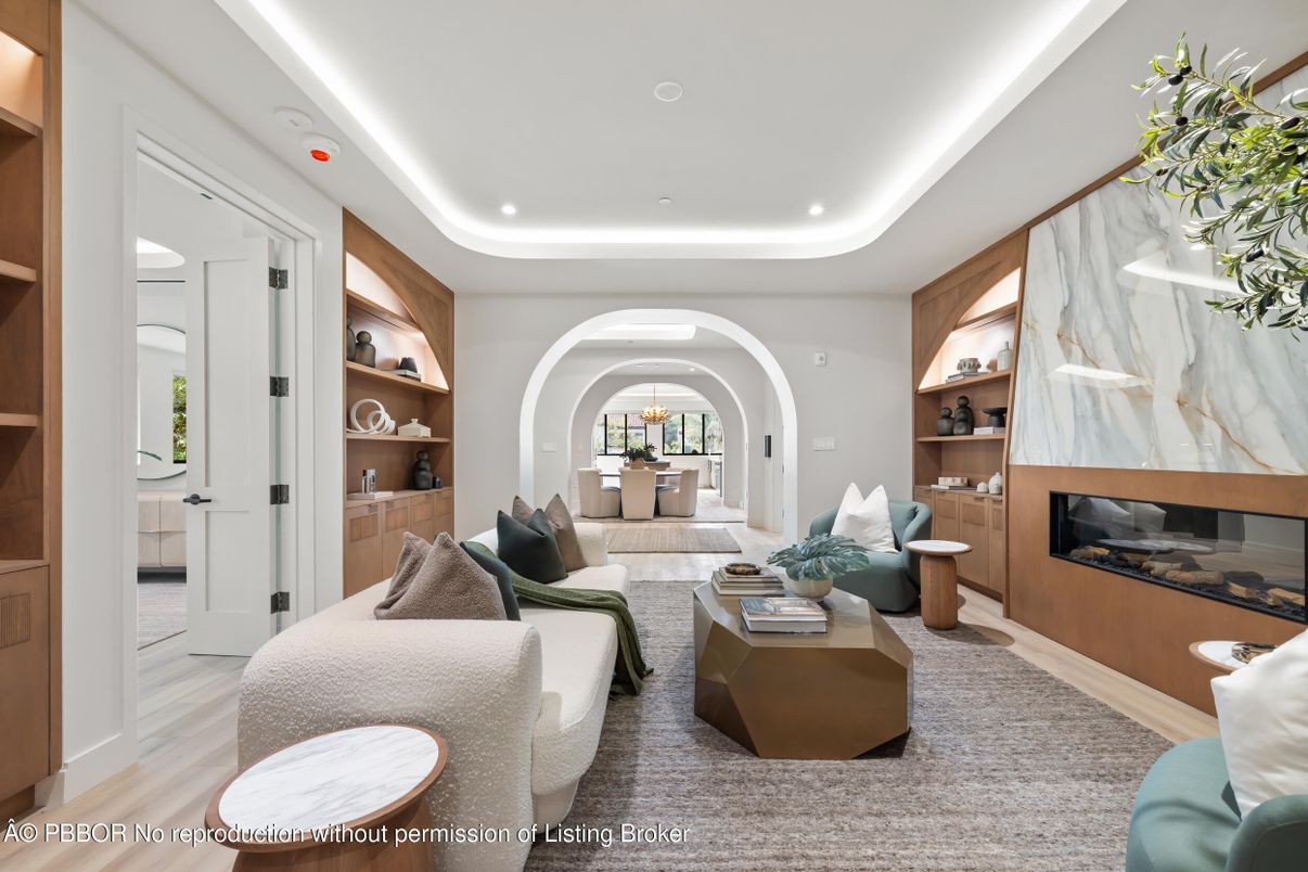 Fireplace, Interior, Living room, Marble Walls, Recessed Lighting, Wood Texture Flooring