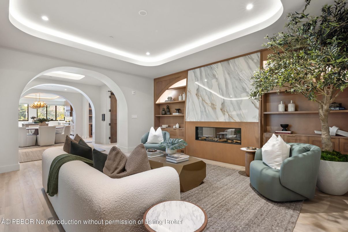 Chandelier, Dining room, Fireplace, Interior, Living room, Marble Walls, Recessed Lighting, Wood Texture Flooring