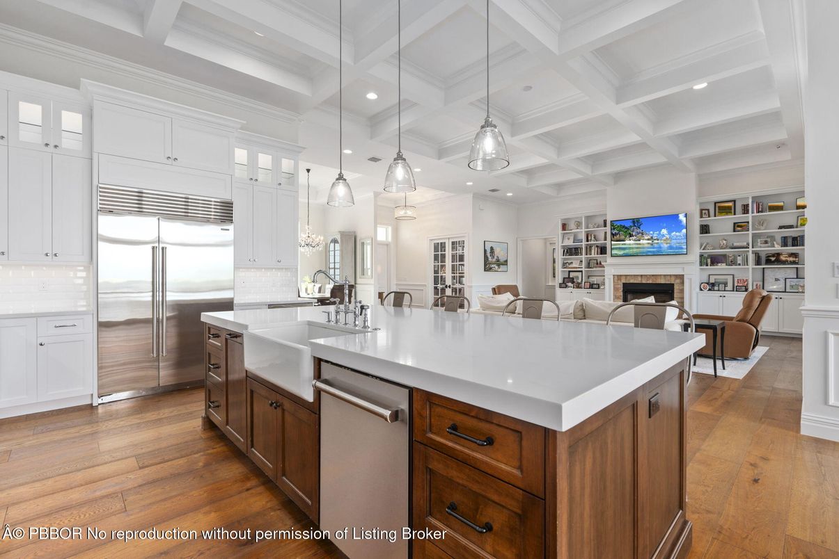 Fireplace, Interior, Kitchen, Living room, Pendant Lights, Recessed Lighting, Stainless Steel Appliances, Wood Texture Flooring