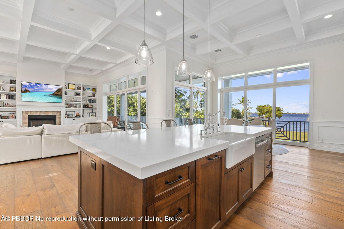 Fireplace, Interior, Kitchen, Living room, Pendant Lights, Recessed Lighting, Water, Wood Texture Flooring