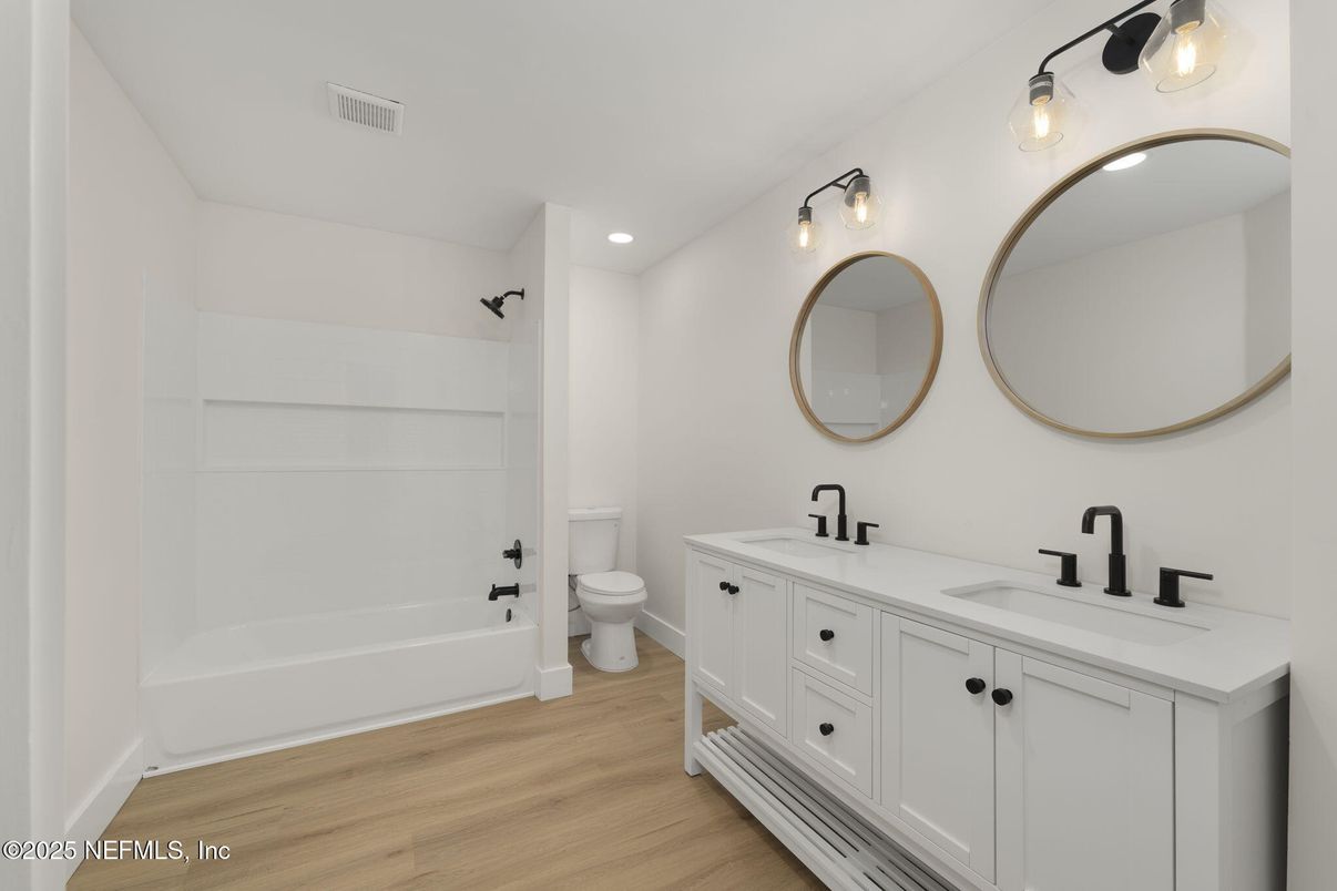 Bathroom, Dual Sink Vanities, Interior, Recessed Lighting, Wood Texture Flooring