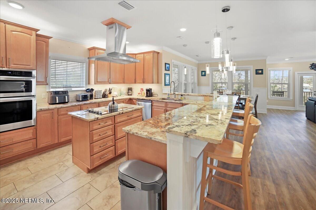 Dining room, Interior, Kitchen, Pendant Lights, Recessed Lighting, Stainless Steel Appliances, Wood Texture Flooring