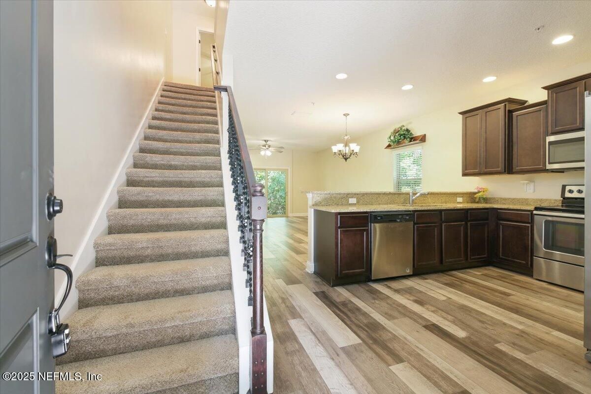 Chandelier, Interior, Kitchen, Recessed Lighting, Stainless Steel Appliances, Wood Texture Flooring