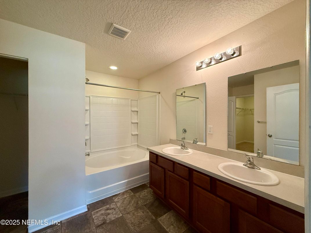 Bathroom, Dual Sink Vanities, Interior, Recessed Lighting, Walk-in Closets