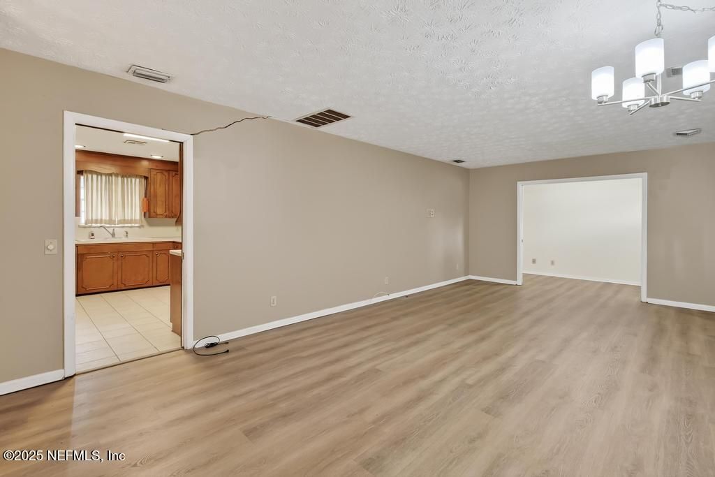 Chandelier, Empty room, Interior, Recessed Lighting, Wood Texture Flooring