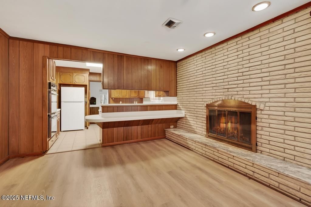 Fireplace, Interior, Kitchen, Recessed Lighting, Stone Walls, Wood Texture Flooring, Wooden Walls
