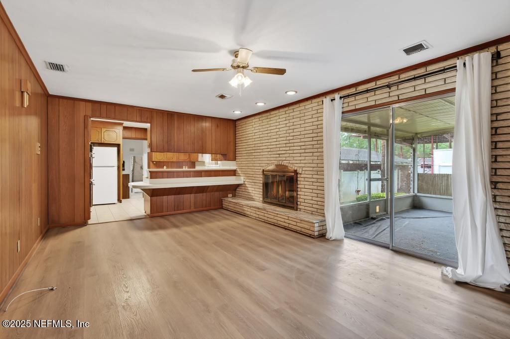 Fireplace, Interior, Kitchen, Recessed Lighting, Stone Walls, Wood Texture Flooring, Wooden Walls