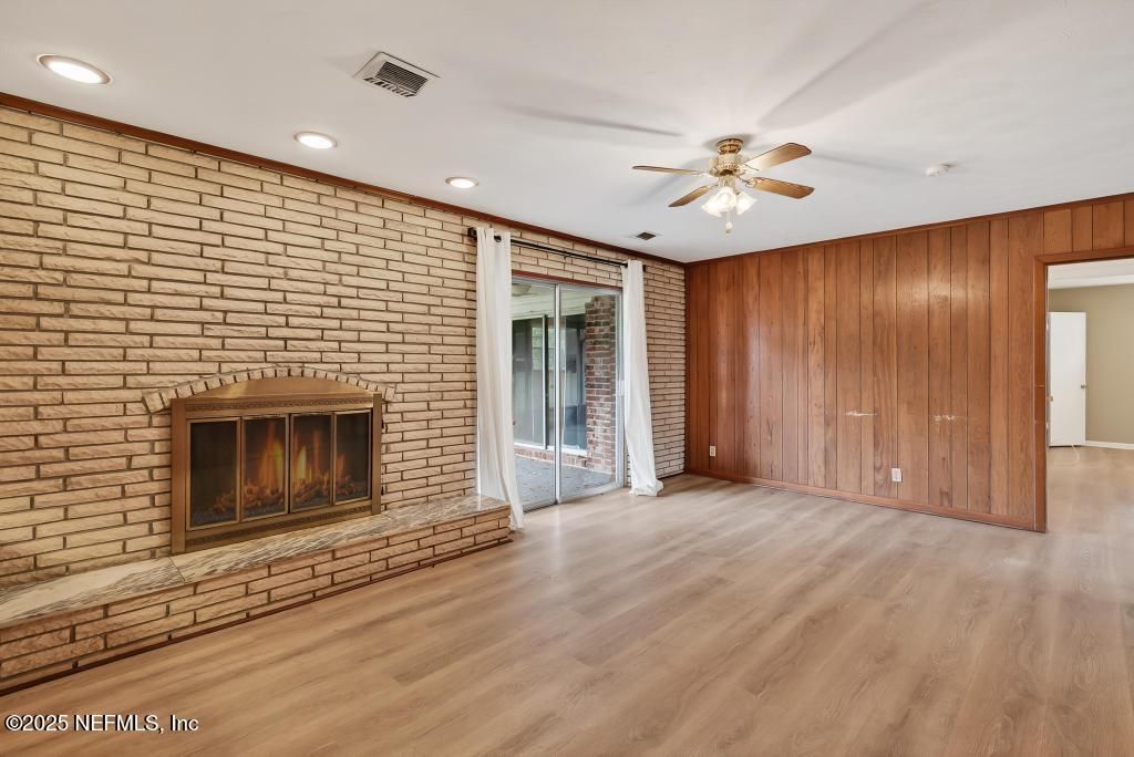 Empty room, Fireplace, Interior, Recessed Lighting, Stone Walls, Wood Texture Flooring, Wooden Walls