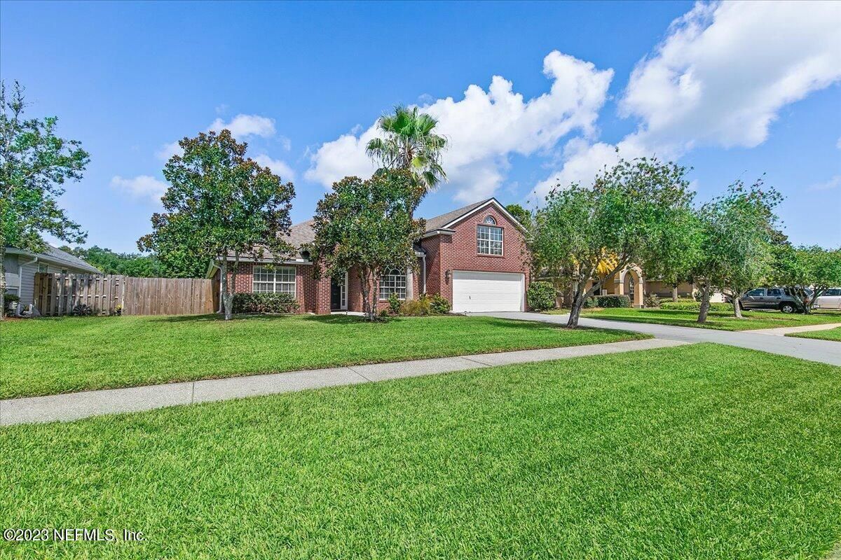 Attached, Backyard, Exterior, Facade, Brick Facade, None