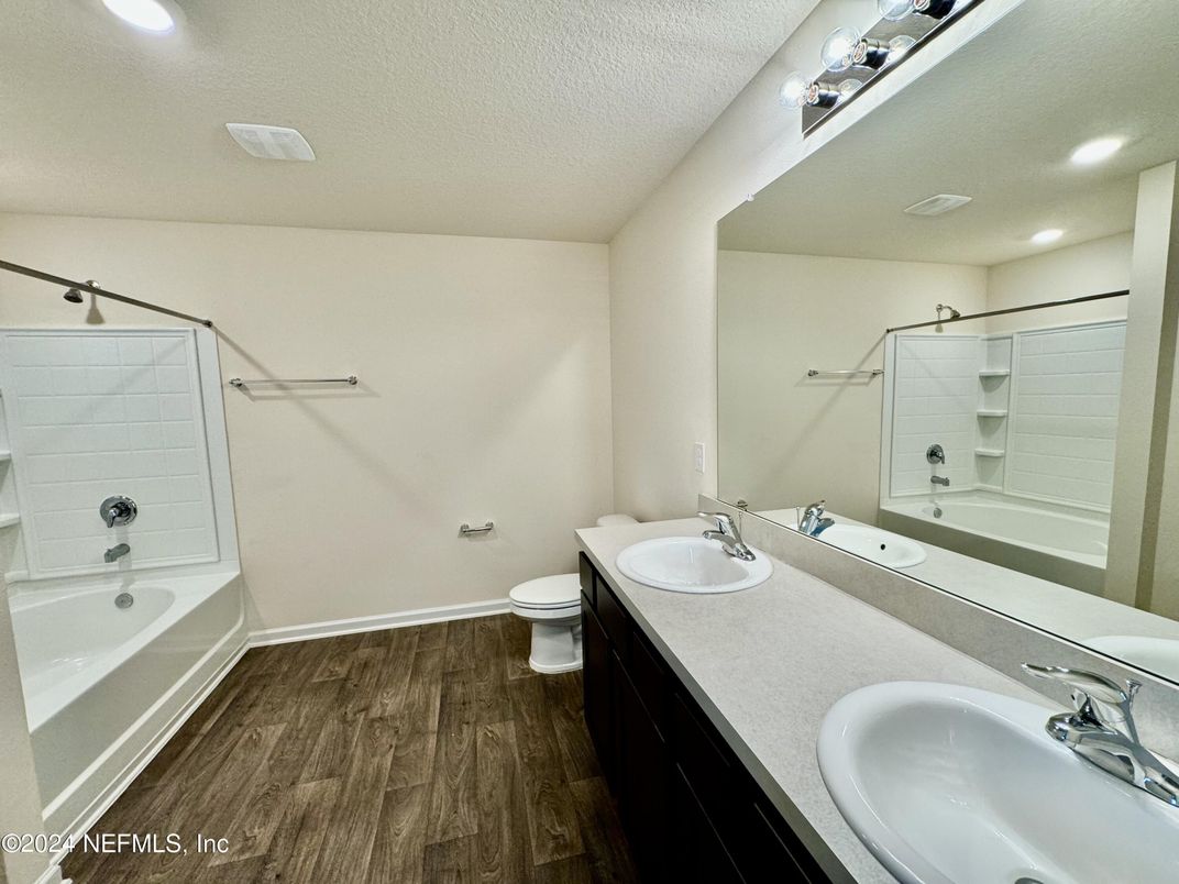 Bathroom, Dual Sink Vanities, Interior, Recessed Lighting, Wood Texture Flooring