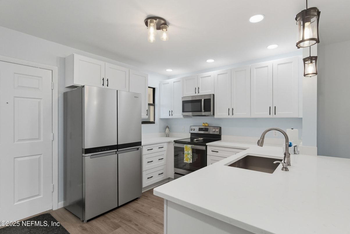 Interior, Kitchen, Pendant Lights, Recessed Lighting, Stainless Steel Appliances, Wood Texture Flooring