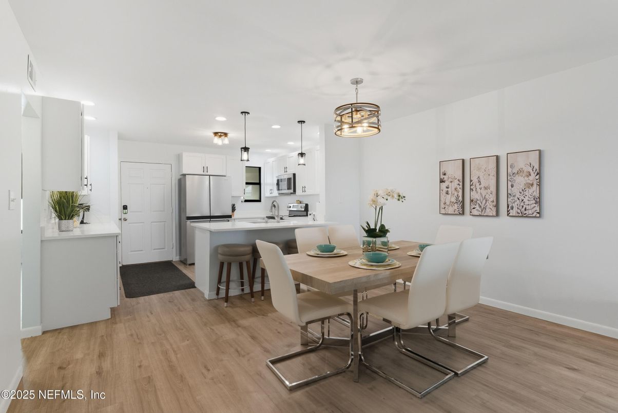 Dining room, Interior, Kitchen, Pendant Lights, Recessed Lighting, Stainless Steel Appliances, Wood Texture Flooring
